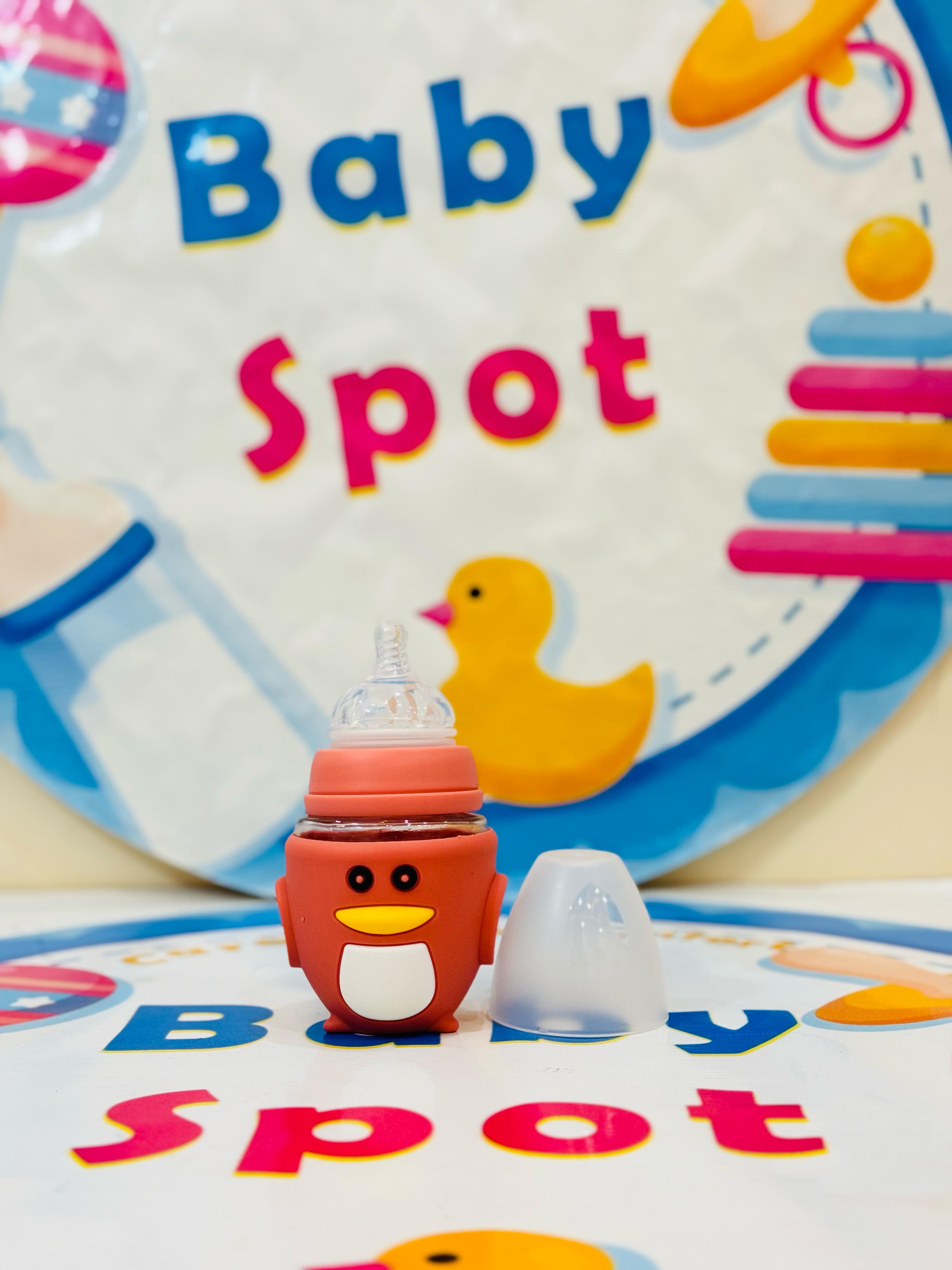 🍼✨ Premium Range Baby Glass Feeder Collection with Silicone Cover ✨🍼
Ensure safe and comfortable feeding with our baby glass feeder – designed with a protective silicone cover for extra grip and safety! 👶💖
💖 Product Features:
✔️ Premium Quality: Made from high-quality glass – BPA-free and safe for babies.
✔️ Silicone Cover: Provides extra protection and a non-slip grip.
✔️ Easy to Clean: Resistant to stains and odors – perfect for everyday use.
✔️ Perfect Size: 120ml capacity – ideal for newborns an