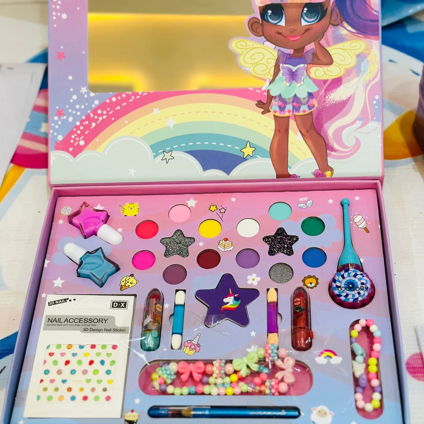 💄&nbsp;Kids' Makeup Kit with Stylish Bag – Sparkle &amp; Play!&nbsp;✨👛

Let your little one explore creativity with this&nbsp;2-in-1 Makeup &amp; Jewelry Kit, designed for endless fun and imaginative play.

🔹&nbsp;Features:
🎀&nbsp;Adorable &amp; Portable&nbsp;– Comes with a glittery bag for easy storage and carry.
💖&nbsp;Safe &amp; Kid-Friendly&nbsp;– Made with non-toxic, washable materials for worry-free play.
🌟&nbsp;Encourages Confidence &amp; Creativity&nbsp;– Helps kids express themselves through 