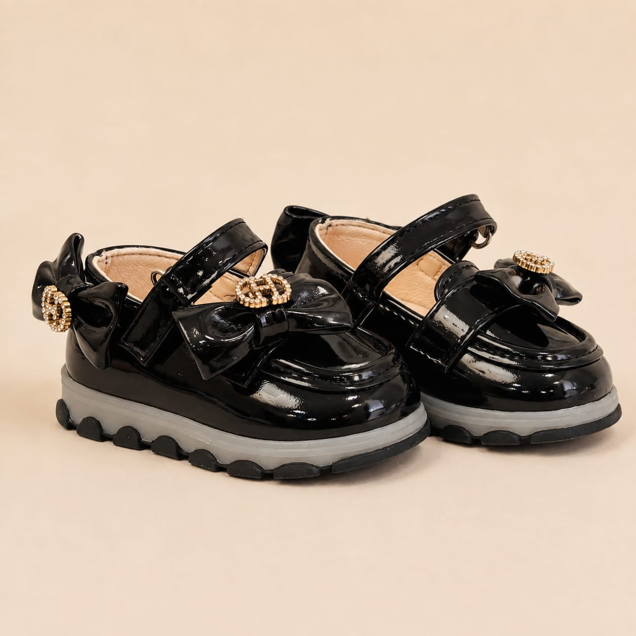 black baby girl shoes, baby girl shoes, girls party shoes, baby party shoes, black patent shoes, patent baby shoes, bow baby shoes, baby bow shoes, rhinestone baby shoes, sparkle baby shoes, princess baby shoes, Mary Jane baby shoes, Mary Jane shoes for girls, baby formal shoes, girls formal shoes, baby wedding shoes, girls wedding shoes, baby birthday shoes, girls birthday shoes, baby Eid shoes, girls Eid shoes, festive baby shoes, fancy baby shoes, imported baby shoes, luxury baby shoes, stylish baby shoe