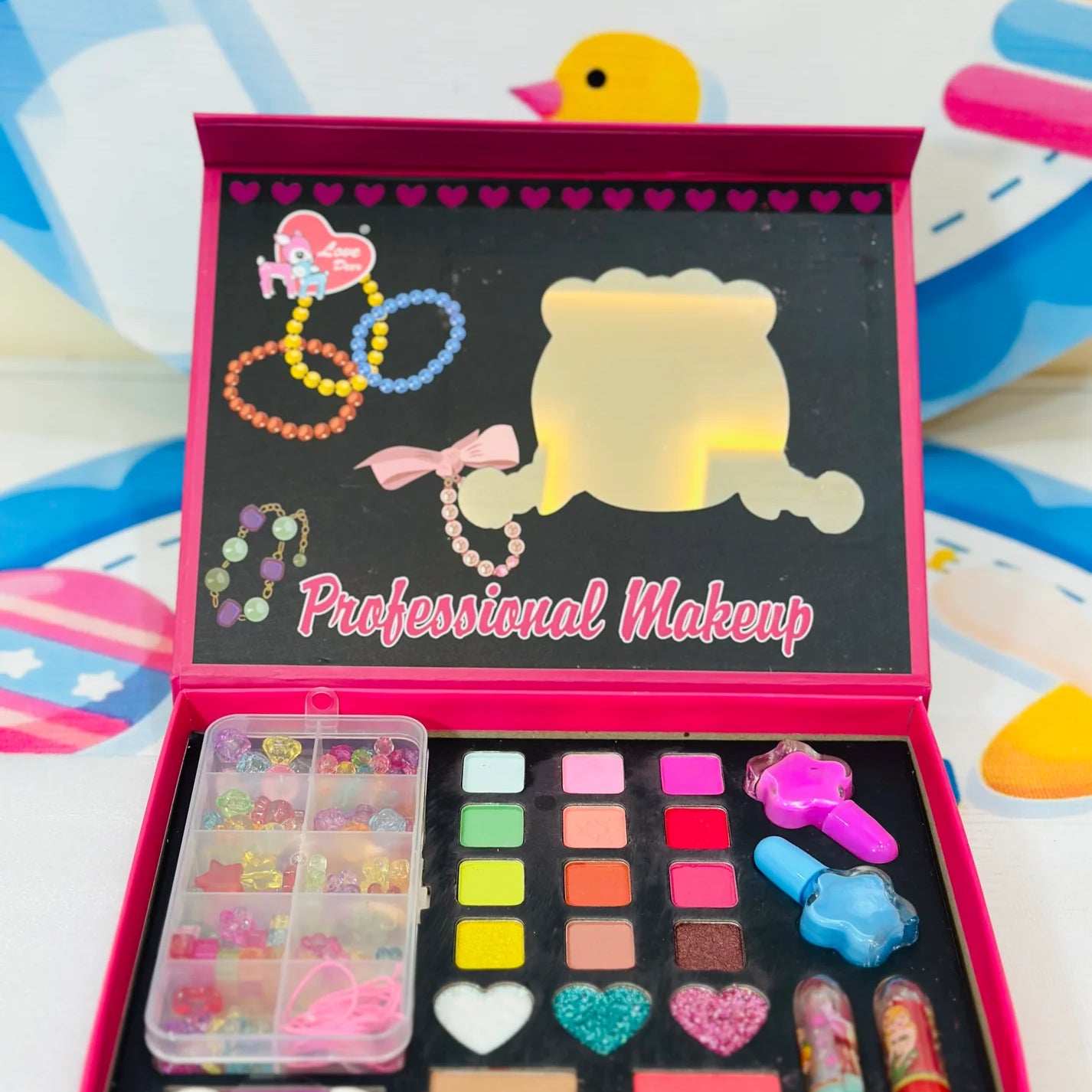 💄&nbsp;Kids' Makeup Kit with Stylish Bag – Sparkle &amp; Play!&nbsp;✨👛

Let your little one explore creativity with this&nbsp;2-in-1 Makeup &amp; Jewelry Kit, designed for endless fun and imaginative play.

🔹&nbsp;Features:
🎀&nbsp;Adorable &amp; Portable&nbsp;– Comes with a glittery bag for easy storage and carry.
💖&nbsp;Safe &amp; Kid-Friendly&nbsp;– Made with non-toxic, washable materials for worry-free play.
🌟&nbsp;Encourages Confidence &amp; Creativity&nbsp;– Helps kids express themselves through 